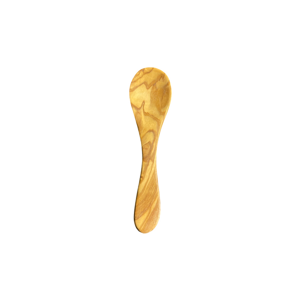 Wooden spoon on a white background