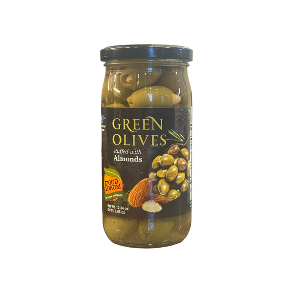 Jar of green olives stuffed with almonds on a white background